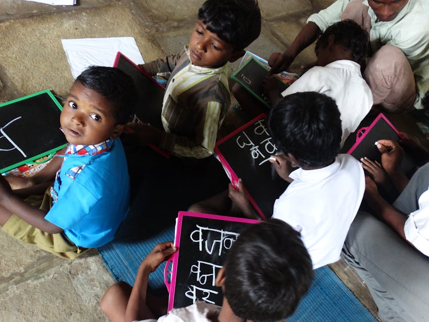 nutritions Young students writing on slates in a village school in Melghat, India.